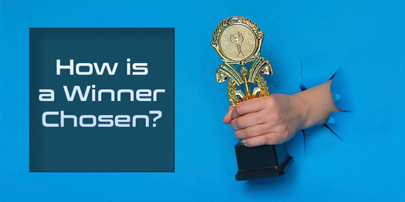 A blue background where a hand holding the world cup has burst through